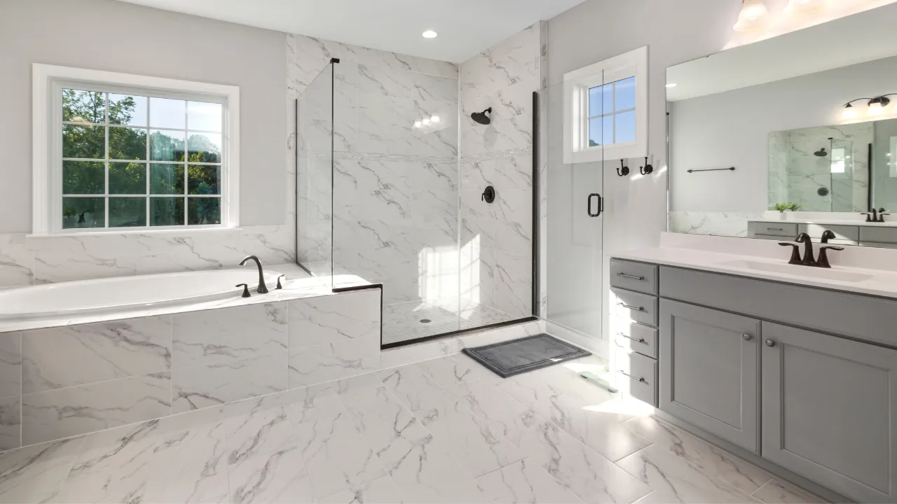 Natural stone marble countertop and tile in a Vancouver WA bathroom